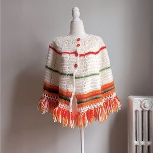 Vintage knitted cape with fringe